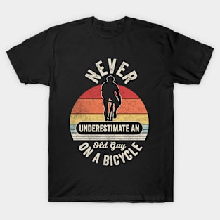 Never Underestimate An Old Guy On A Bicycle Funny Cycling Vintage Biker Cyclist Dad Gift Biker Gift Retro Bike T-Shirt